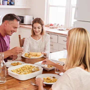 family eating dinner in the kitchen