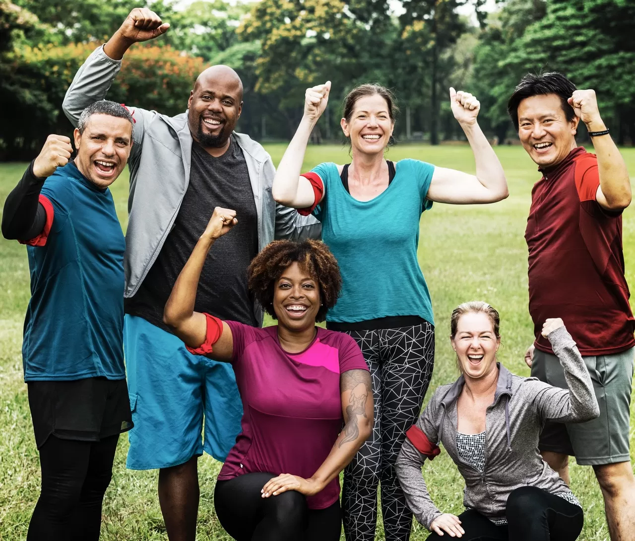 group of cheerful running friends