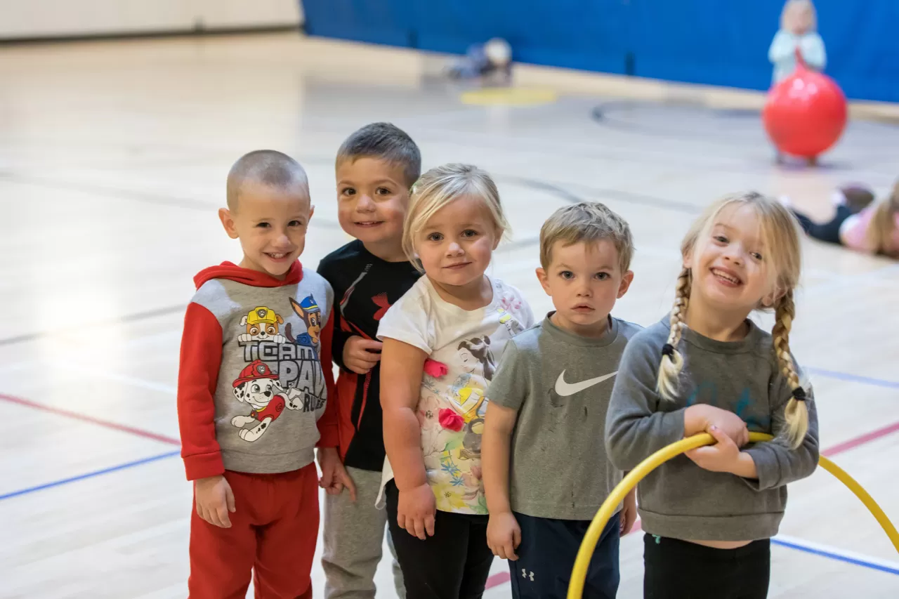 children playing in the YMCA gym