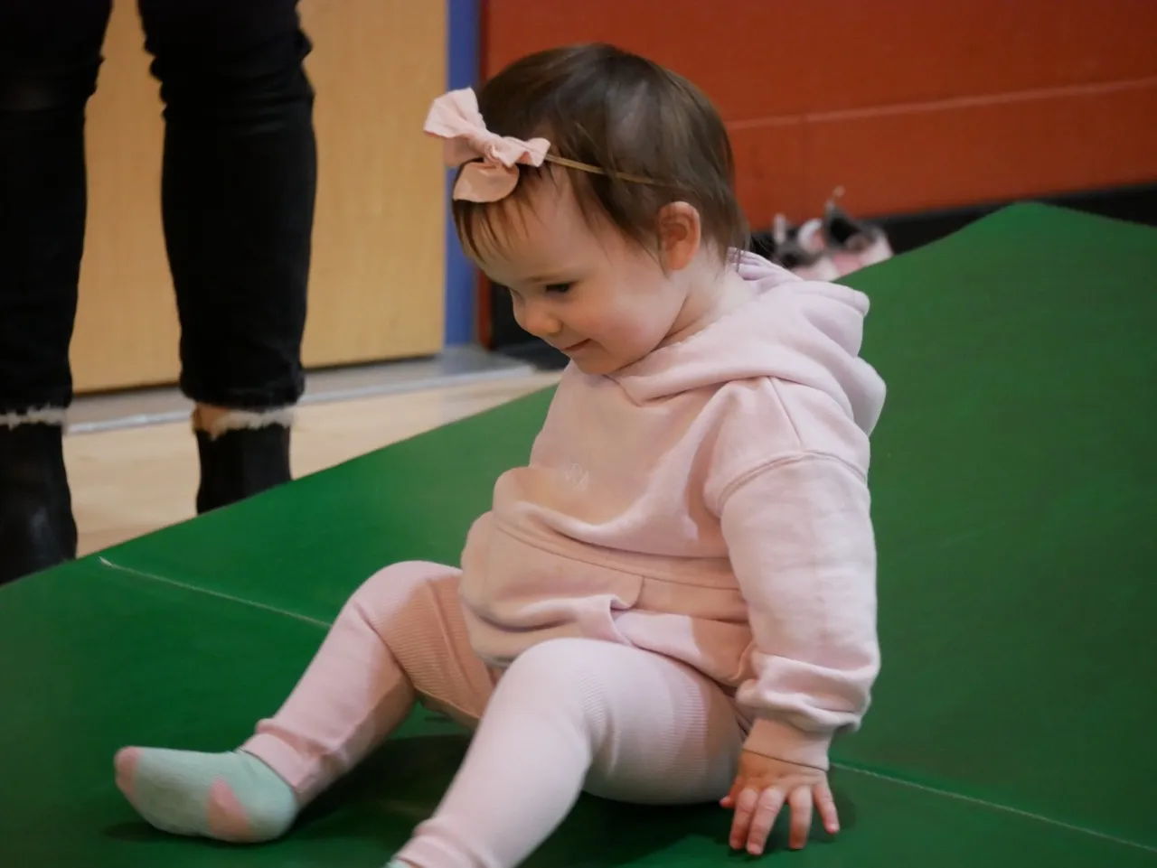 toddler playing at kindergym