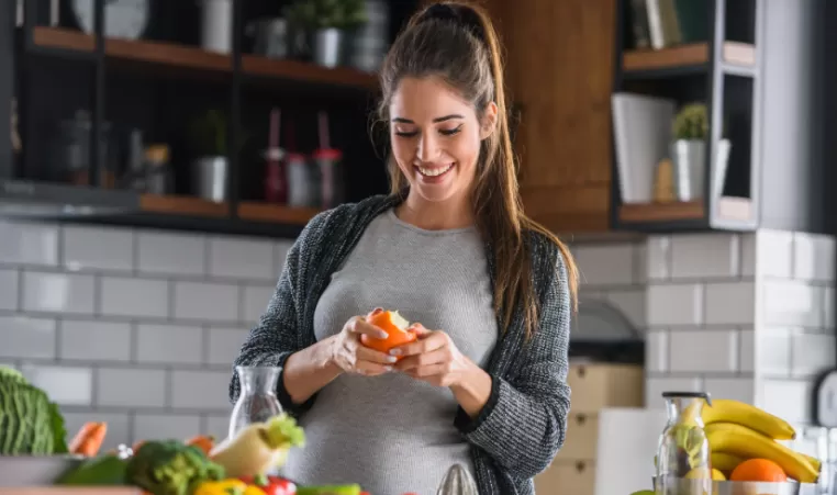 woman eating fruit