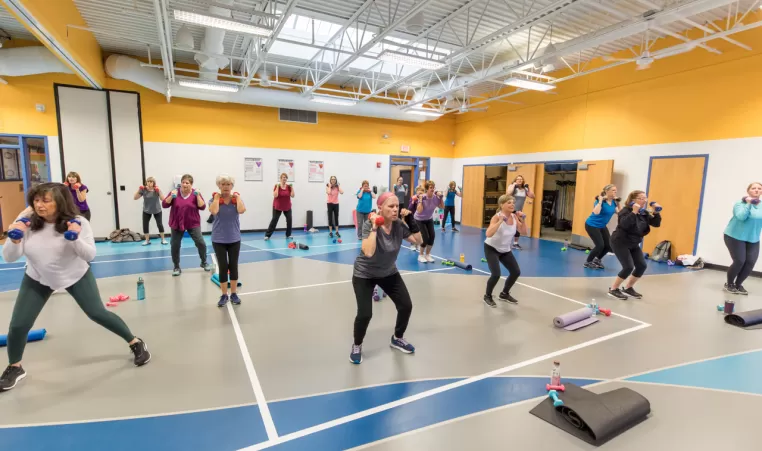 group of seniors in a group exercise class