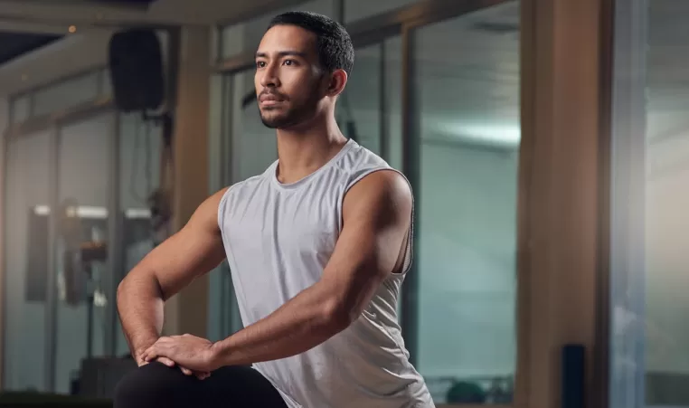 man doing a lunge stretch