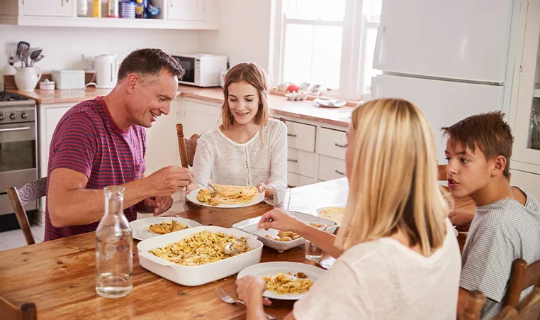 family eating dinner in the kitchen