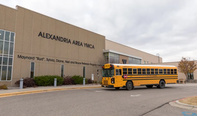 a school bus in the YMCA parking lot