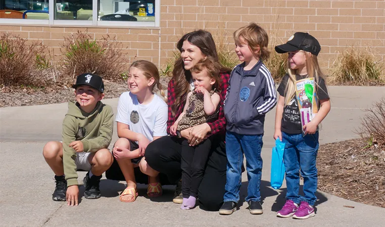 smiling group outside the YMCA