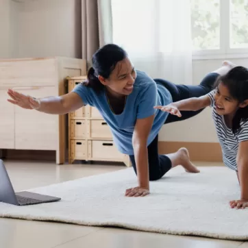 mother and daughter exercising