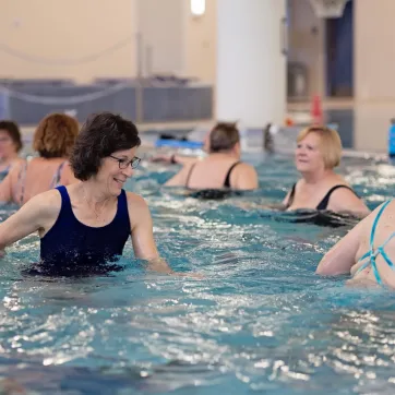senior women in water aerobics class